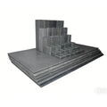 A 36-piece L&L TB2318 model-specific kiln furniture set, including posts and shelves, arranged for optimized stacking in pottery and ceramic kilns.