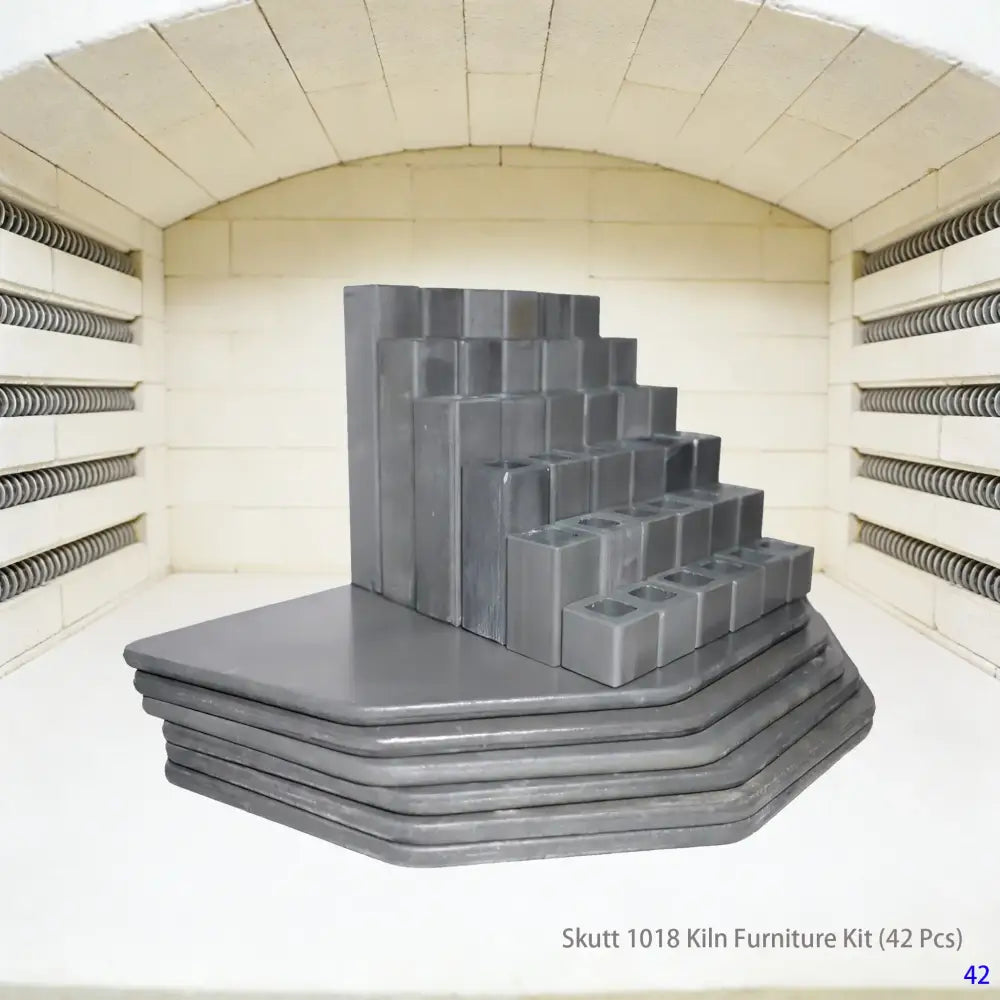 A complete 42-piece high-temperature kiln furniture set designed for Skutt 1018 electric kilns, featuring various thicknesses of square and round refractory shelves, alumina posts in different heights, and triangular stilts, suitable for professional firing processes such as ceramic glaze firing and bisque firing in pottery studios.
